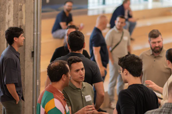 I speak with attendees during AGIV INDUSTRIES networking